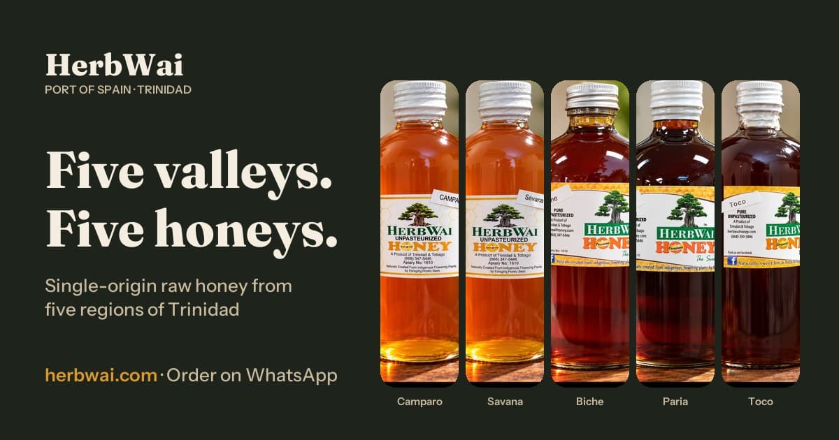 Five bottles of HerbWai raw honey, light to dark